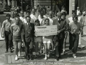 Para Olympic team receiving cheque from Lord Provost in 1990