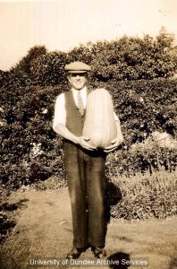 Gardener with large marrow